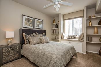 Bedroom with couch at The Fairways by Picerne, Las Vegas, NV, 89141